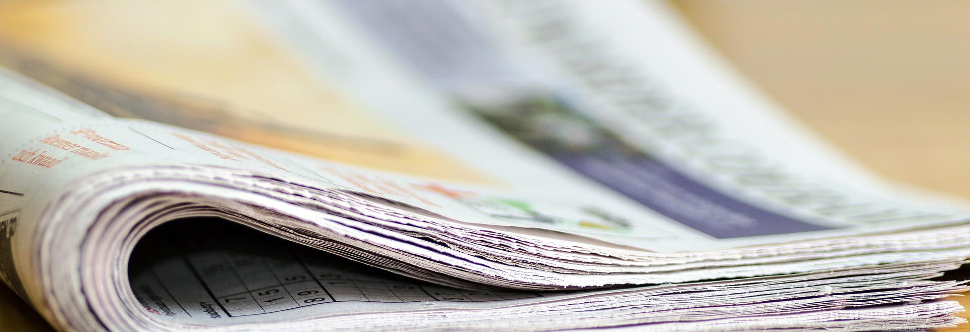 journal plié en deux