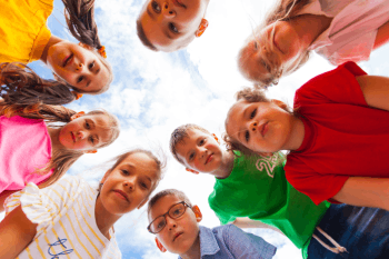 low-angle-view-friends-against-sky